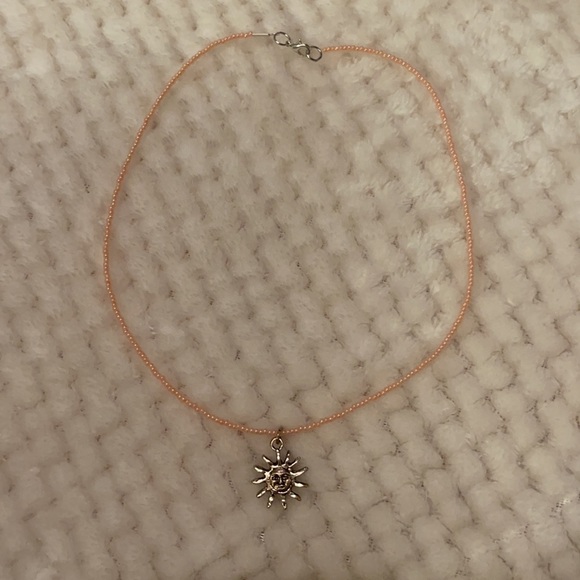 Peach hand- made beaded necklace with sun charm - Picture 4 of 4